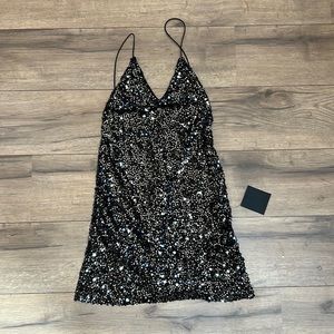 Lulus black sequin mini dress new with tags. Size XS.